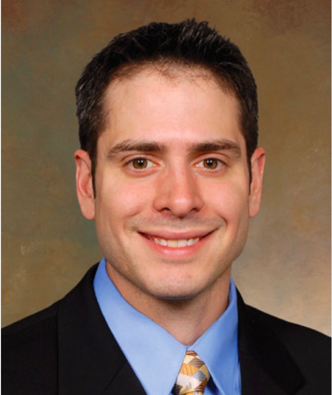 headshot of spine surgeon bradford a curt