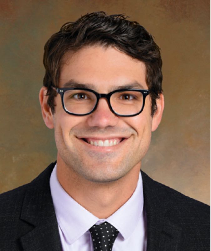 headshot of spine surgeon randall j hlubek