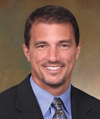 headshot of spine surgeon andrew j ringer
