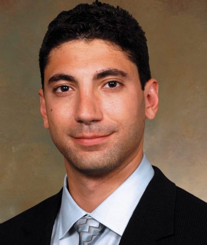 headshot of spine surgeon ryan d tackla