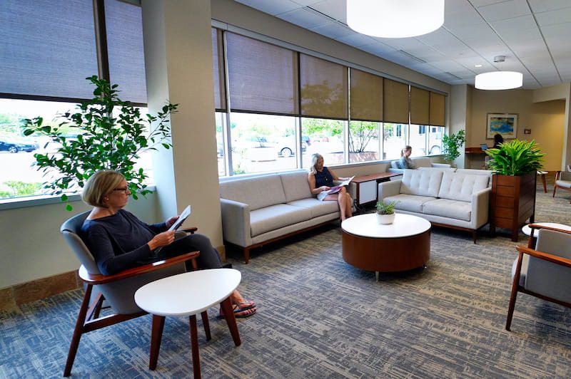 lobby with comfortable chairs and tables for minimally invasion spine surgery